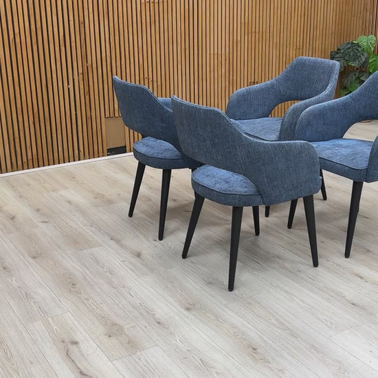 Video demonstration showing the build quality, fabric texture, and stability of the ‘Manu’ navy blue dining chairs.