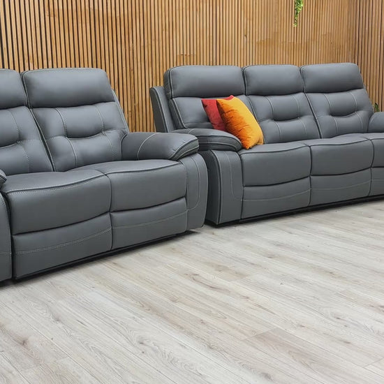 Product video tour of the ‘Dante’ Grey Fabric 3+2 Manual Recliner Set, demonstrating the smooth reclining action and the generous seating space of both sofas.