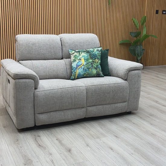 Video of Furniture Village ‘Genius’ premium 2-seater power recliner sofa, beautifully upholstered in high-performance Anivia khaki fabric.