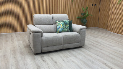 Video of Furniture Village ‘Genius’ premium 2-seater power recliner sofa, beautifully upholstered in high-performance Anivia khaki fabric.