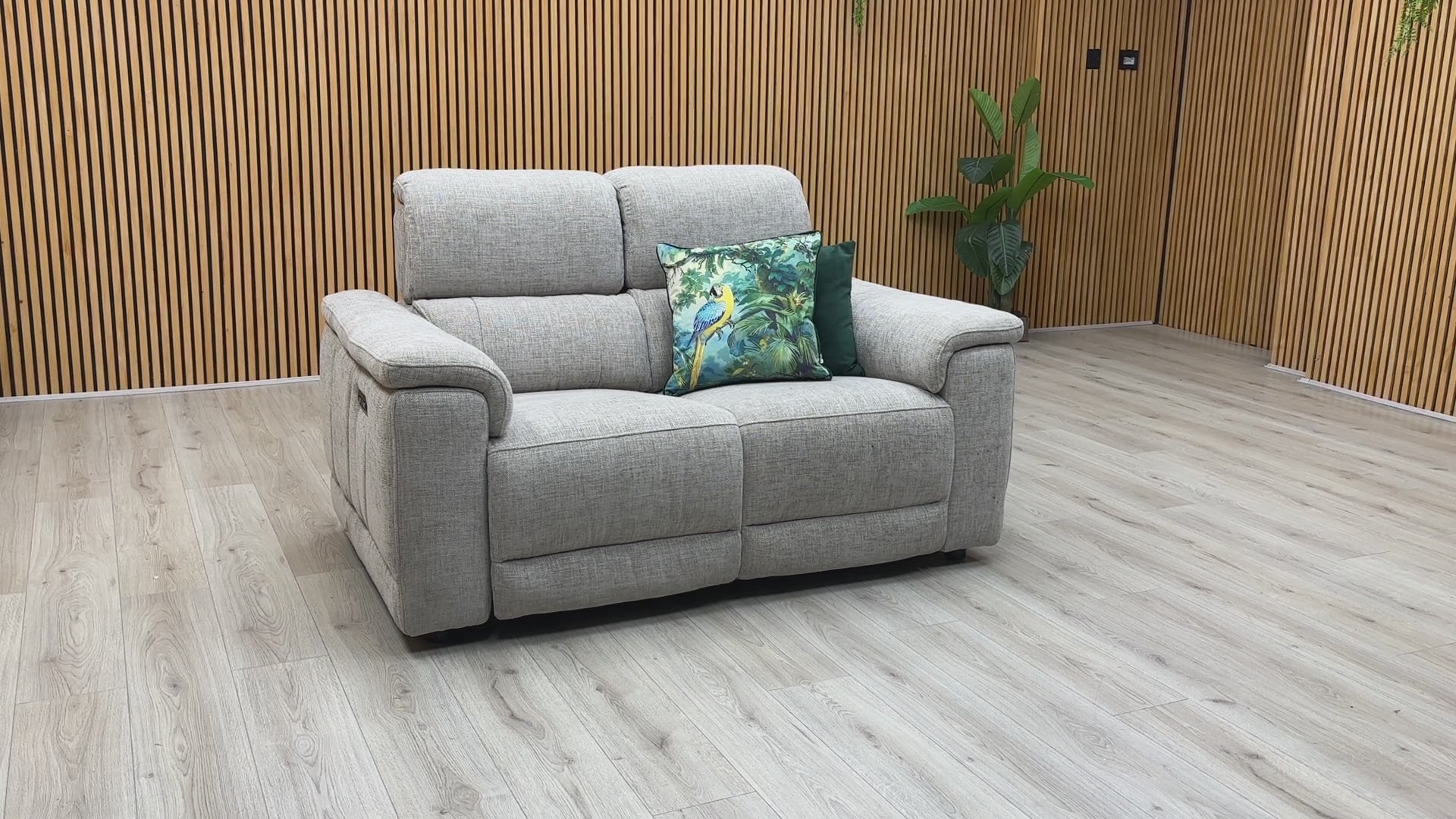 Video of Furniture Village ‘Genius’ premium 2-seater power recliner sofa, beautifully upholstered in high-performance Anivia khaki fabric.