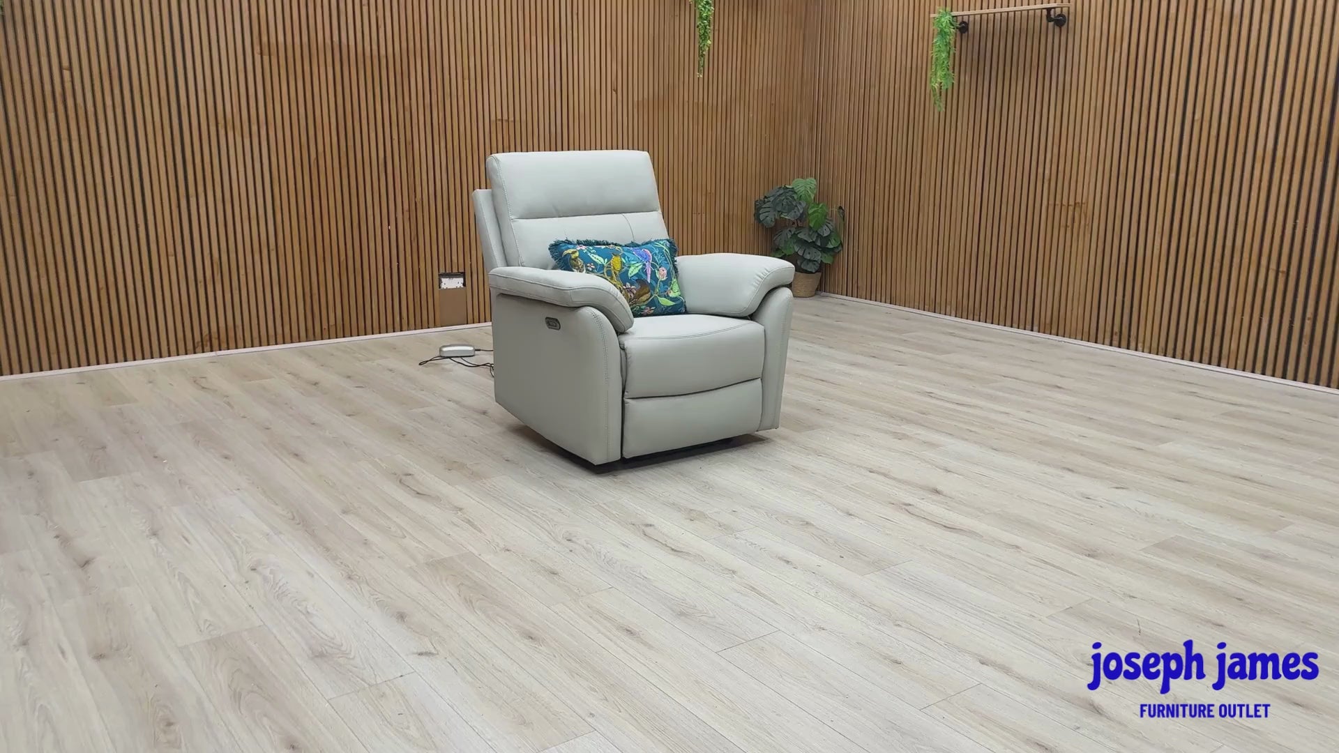 Video Of ‘Sally’ contemporary living room suite, showcasing a luxury 3-seater power recliner sofa and a matching power recliner armchair beautifully upholstered in premium Light Grey leather.