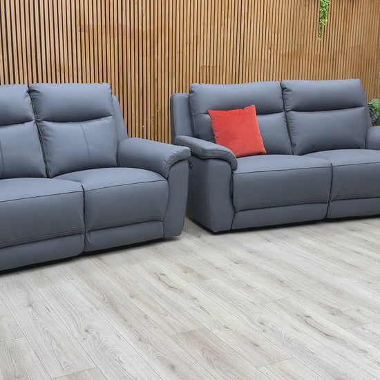 Product walkthrough of the Bobby Navy Blue leather set, demonstrating the smooth power recline action and the premium leather finish.