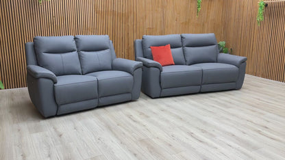 Product walkthrough of the Bobby Navy Blue leather set, demonstrating the smooth power recline action and the premium leather finish.