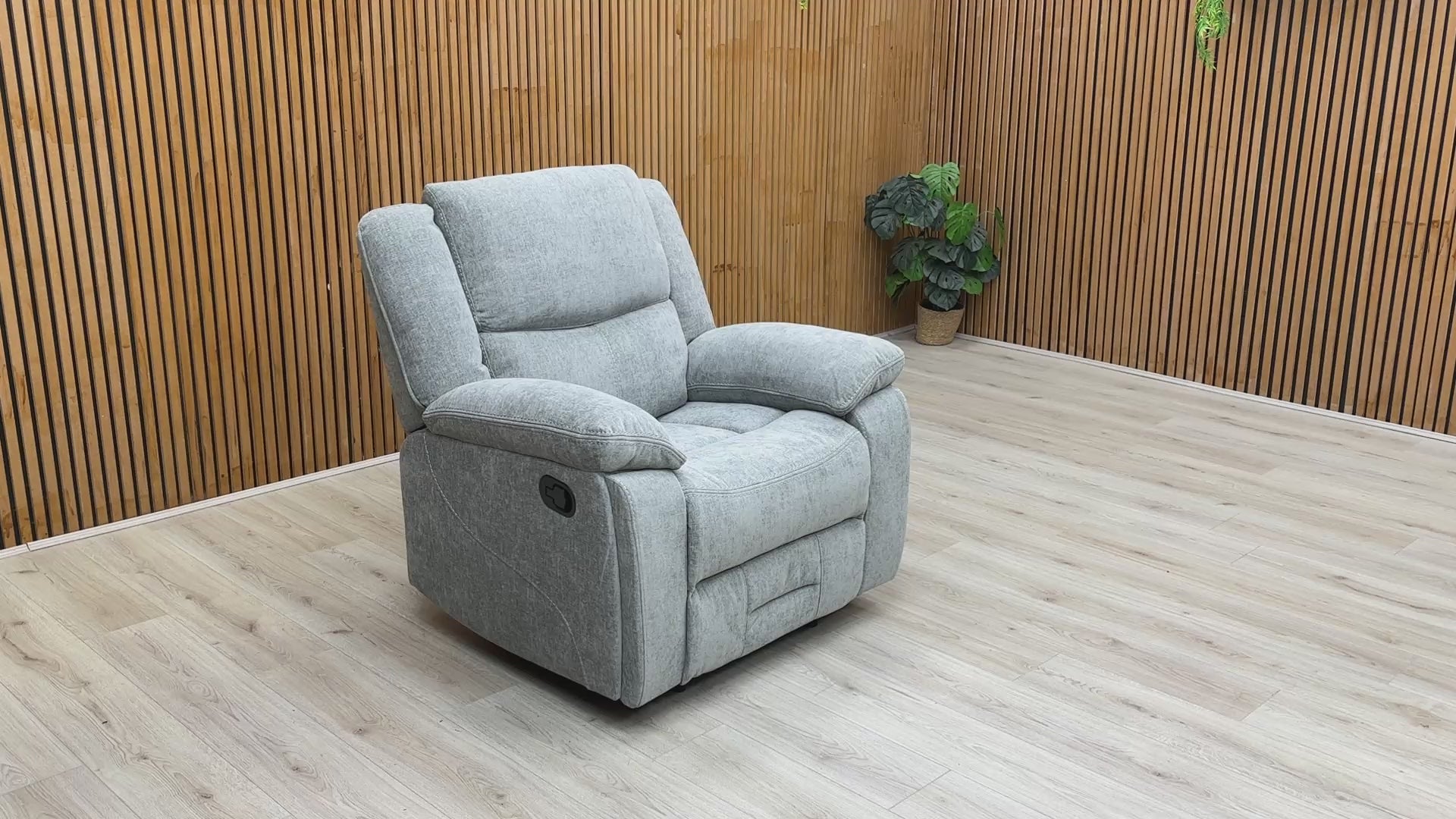 Video preview demonstrating the comfort and manual reclining action of the Weston Light Grey Recliner Chair.
