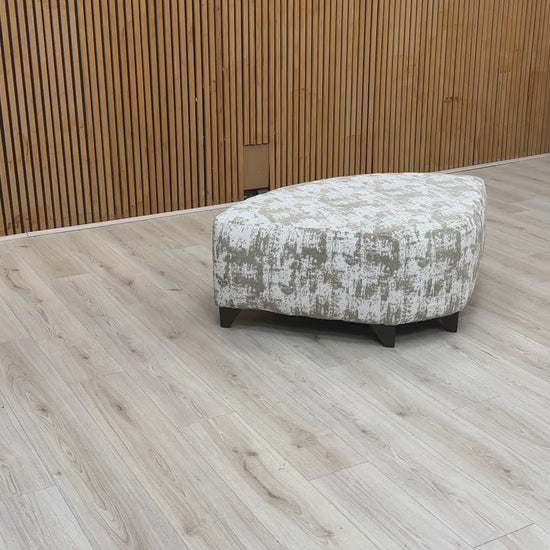 Product video tour of the ‘Aura’ Kai Mocha Wedge Footstool, demonstrating the fabric’s tactile finish, seat firmness, and overall build quality.