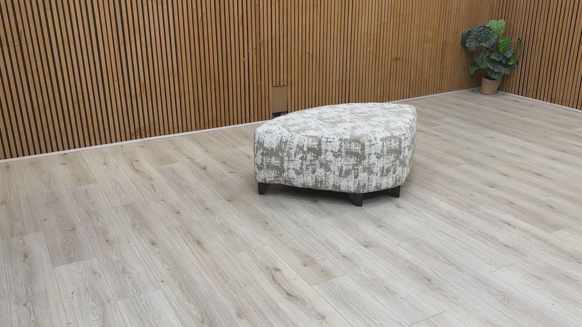 Product video tour of the ‘Aura’ Kai Mocha Wedge Footstool, demonstrating the fabric’s tactile finish, seat firmness, and overall build quality.