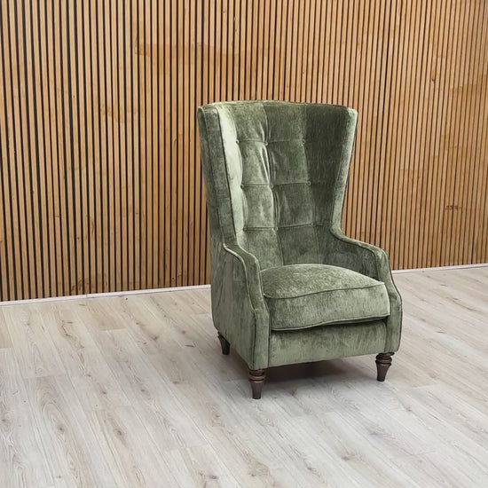 Product video tour of the ‘Garland’ California Olive Green Chenille Accent Chair, demonstrating the fabric’s tactile quality and the chair’s ergonomic support.