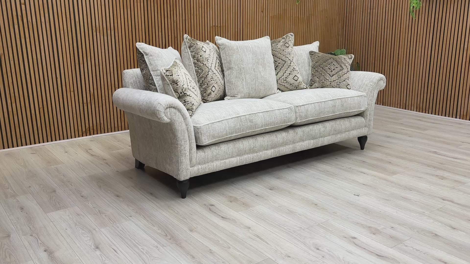 Video of The Parker Knoll 'Plaza' Grande Sofa placed in a living room setting, showcasing its elegant style and rolled arms.