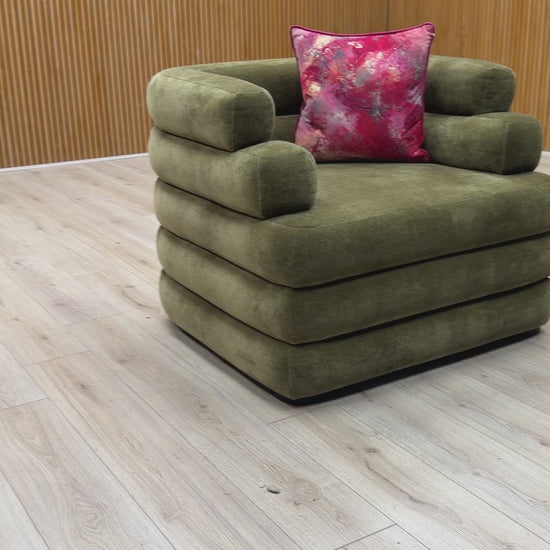 Video tour of the Sofology ‘Stacked’ Armchair, demonstrating the fabric’s sheen, cushion support, and high-quality upholstery work.
