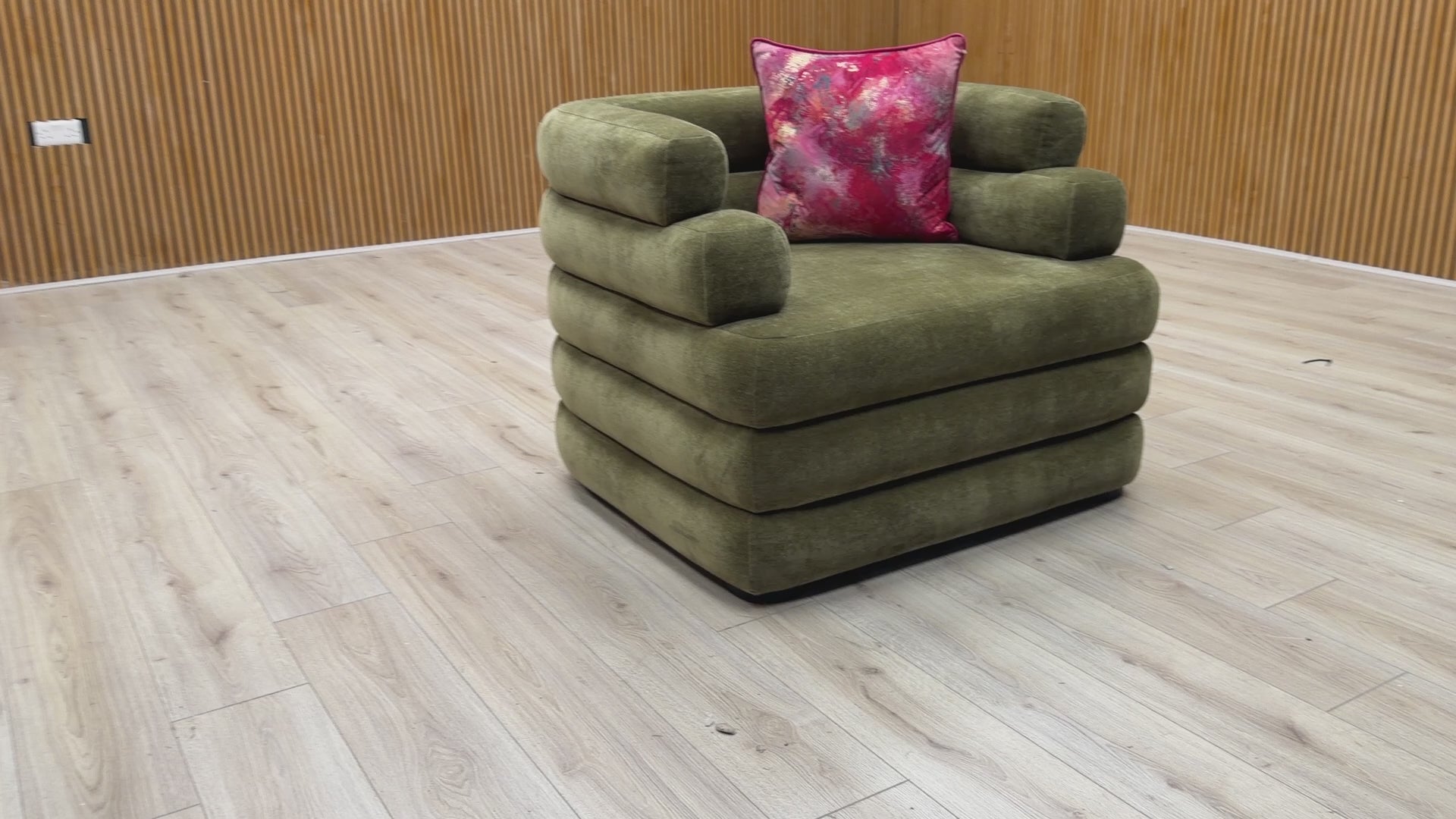 Video tour of the Sofology ‘Stacked’ Armchair, demonstrating the fabric’s sheen, cushion support, and high-quality upholstery work.