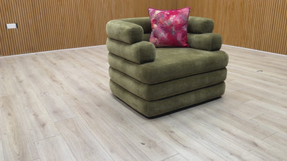 Video tour of the Sofology ‘Stacked’ Armchair, demonstrating the fabric’s sheen, cushion support, and high-quality upholstery work.