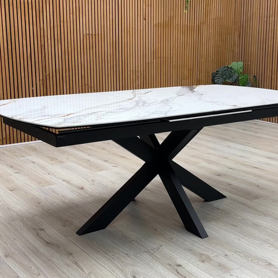 Product video tour of the ‘Raul’ Fiorentino Marble Ceramic Pop-Up Extending Dining Table, demonstrating the smooth action of the automatic central pop-up extension mechanism.