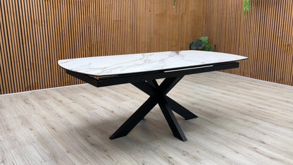 Product video tour of the ‘Raul’ Fiorentino Marble Ceramic Pop-Up Extending Dining Table, demonstrating the smooth action of the automatic central pop-up extension mechanism.