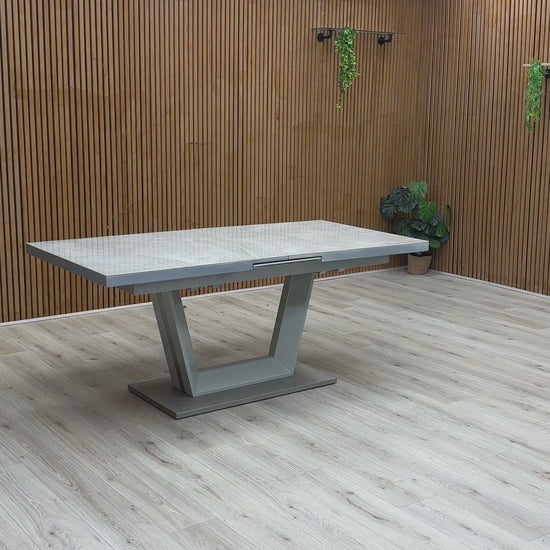 Video of pop-up extension mechanism of the Grigio dining table in action, demonstrating how easily it extends.