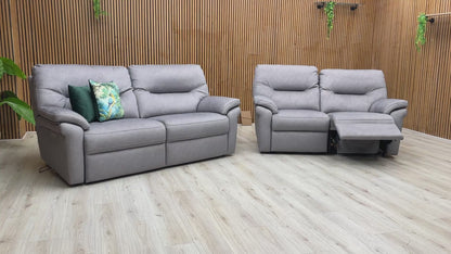 Video demonstration showing the smooth power reclining action and the quick-heating seat functionality for both sofas.