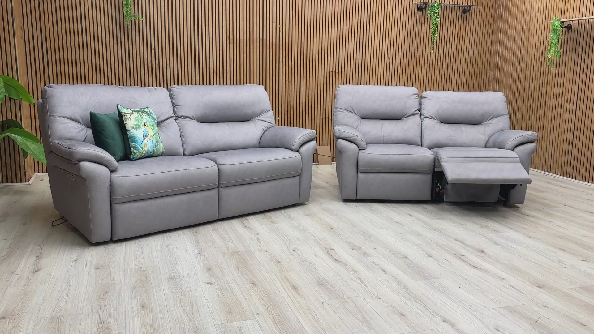 Video demonstration showing the smooth power reclining action and the quick-heating seat functionality for both sofas.