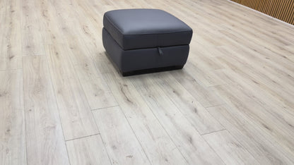 Product video showing the smooth opening mechanism and interior storage space of the leather footstool.
