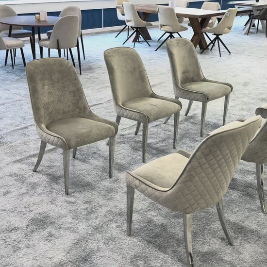 Video demonstration of the 'Gabana' stone velvet dining chair, showcasing the fabric texture and modern design.