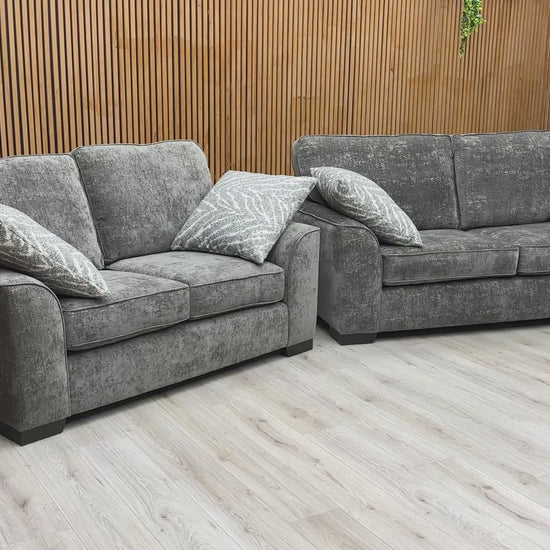 Video showcasing the design and comfort of the 'Theodore' Meridian Charcoal Grey Sofa Set.