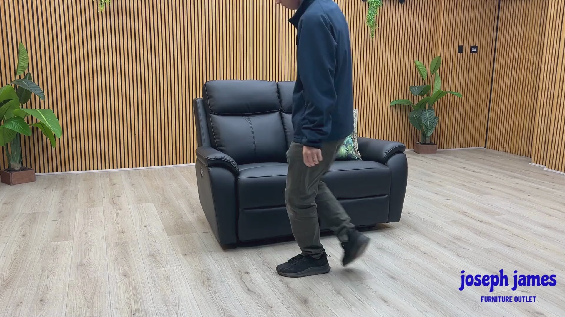 Video Of ‘Kingsmere’ contemporary 2-seater power recliner sofa, beautifully upholstered in high-grade matte Black Leather.