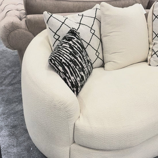 Video showcase of the ‘Bow’ 4-seater sofa, highlighting the 360-degree design and fabric texture.
