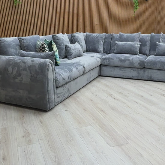 Video content demonstrating the velvet fabric and scale of the 'Alarna' sofa.