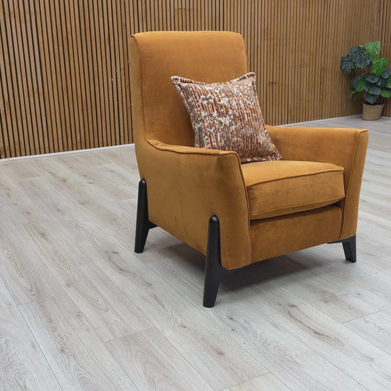 Video thumbnail for a clip demonstrating the features and solid orange color of the 'Collins' Towel Velvet Accent Chair.