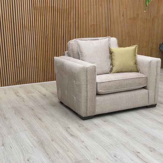Video showcase of the Chelsea snuggler chair, detailing the soft texture of the Vogue velvet and the supportive foam-filled formal back cushions.