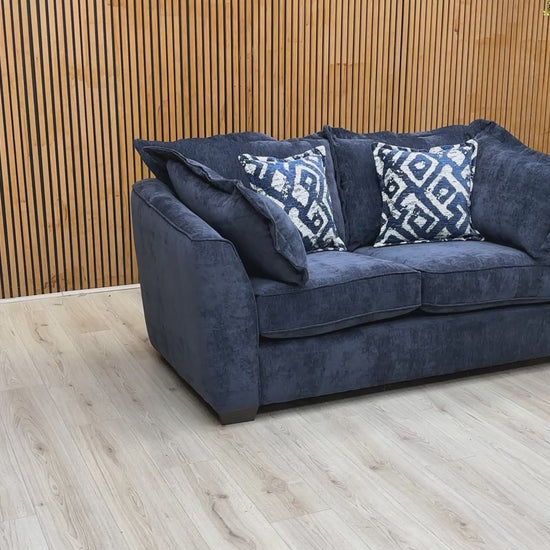 Product video tour of the ‘Finchley’ Denim Blue Soft Weave 2 Seater Sofa, demonstrating the fabric’s tactile quality, cushion recovery, and solid build.