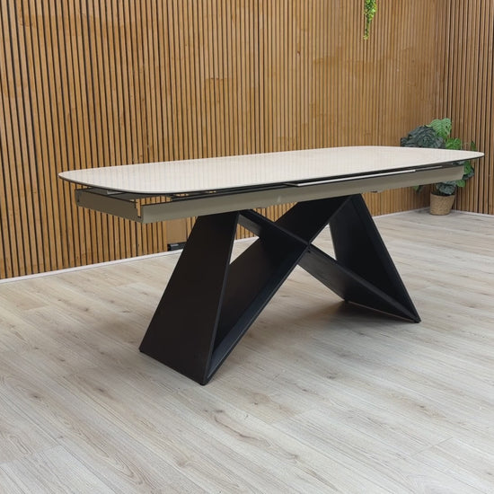 Video demonstration showing the smooth pop-up extension mechanism of the Oasis table, extending from 180cm to 240cm.