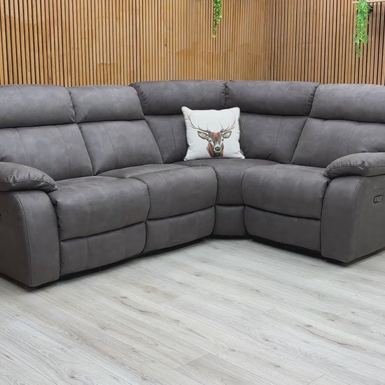 Product video tour of the ‘Moreno’ Grey Suede Fabric Power Recliner Corner Sofa, demonstrating the reclining functionality and fabric texture.