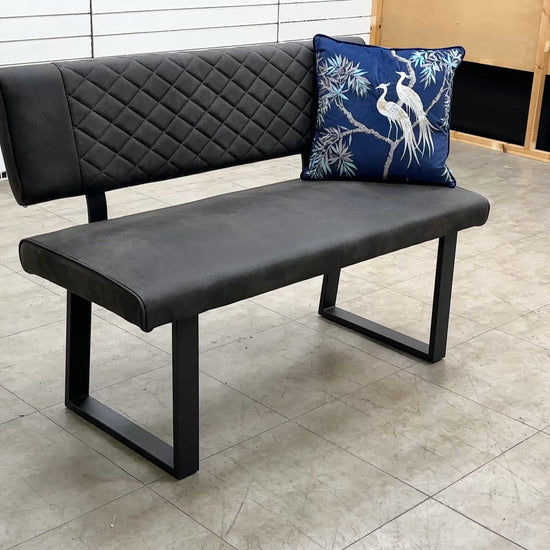 Video demonstration of the 'Warrior' upholstered grey dining bench, showcasing its size, comfort, or quilted stitching detail.