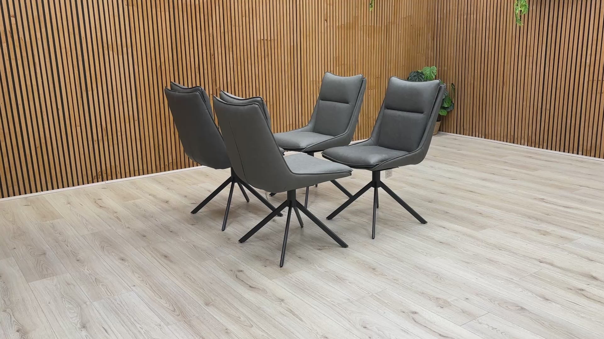 Video : Furniture Village ‘Catalina’ Dark Grey Faux Leather Swivel Dining Chair demonstrating its rotation/swivel function.