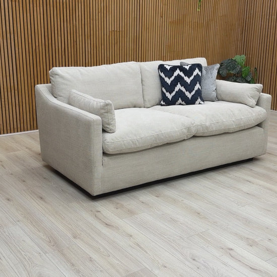 Product walkaround video highlighting the fabric texture and durable construction of the Dream sofa.