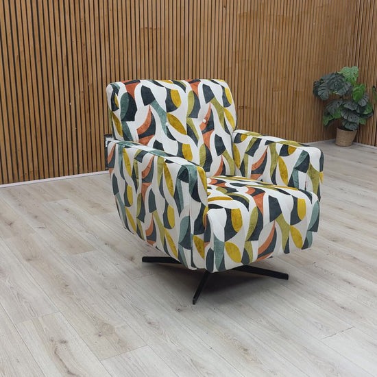 Product video tour of the ‘Hedingham’ Terrazzo Velvet Accent Swivel Chair, demonstrating the fluid 360 swivel rotation, the soft fabric texture, and the premium UK-handmade craftsmanship.