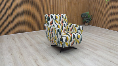 Product video tour of the ‘Hedingham’ Terrazzo Velvet Accent Swivel Chair, demonstrating the fluid 360 swivel rotation, the soft fabric texture, and the premium UK-handmade craftsmanship.