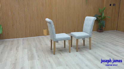 Furnitureland ‘Augusta’ Mist Grey Fabric Pair of Roll Back Upholstered Dining Chairs