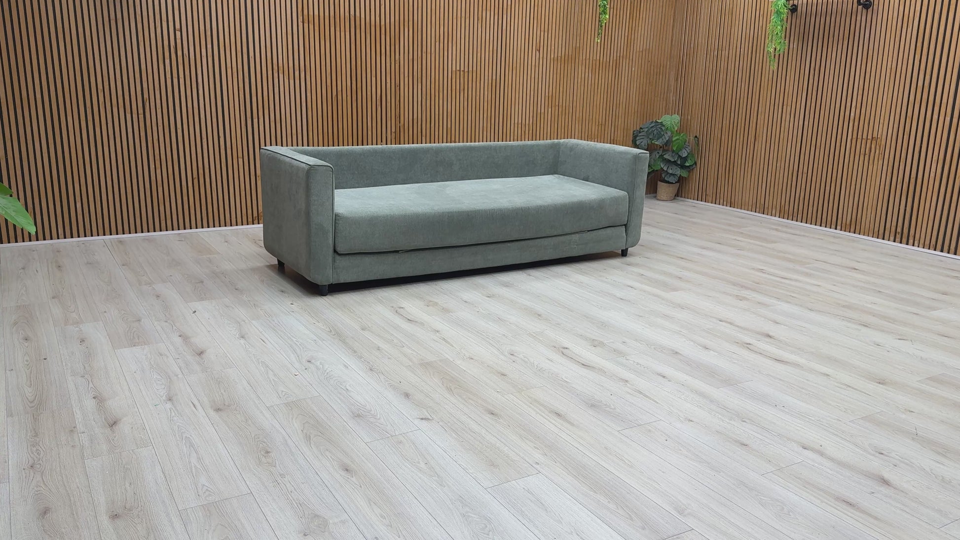 Product video tour of the ‘Esprit’ Grey Fabric Fold Out Day Bed, demonstrating how easily it transitions from a comfortable sofa to a sleep space, along with its fabric quality and build.