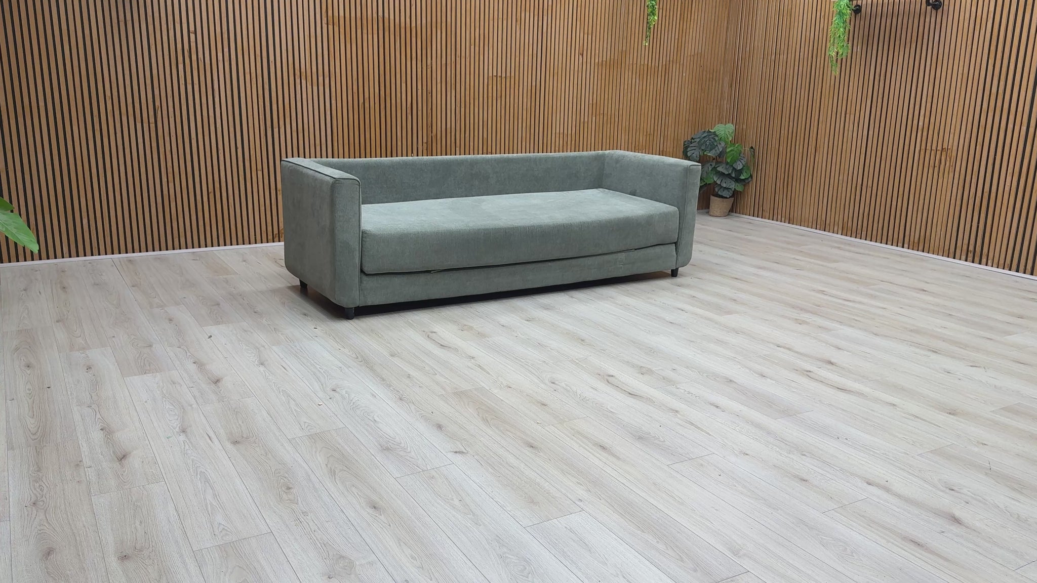 Product video tour of the ‘Esprit’ Grey Fabric Fold Out Day Bed, demonstrating how easily it transitions from a comfortable sofa to a sleep space, along with its fabric quality and build.