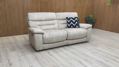Product video demonstration of the ‘Nimbus’ Cream Velvet 3 Seater Power Recliner Sofa, highlighting the reclining mechanism and integrated USB charging port.