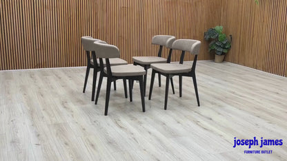 Video Of ‘Connubia Siren S0A’ contemporary dining chairs, showing a matching set of 4 individual chairs featuring a sleek Graphite wooden frame and seats upholstered in Vintage Desert Taupe faux leather.
