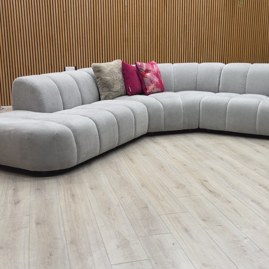 Product walkthrough of the Waldorf corner sofa, demonstrating the seating depth, cushion firmness, and the unique open-end chaise configuration.