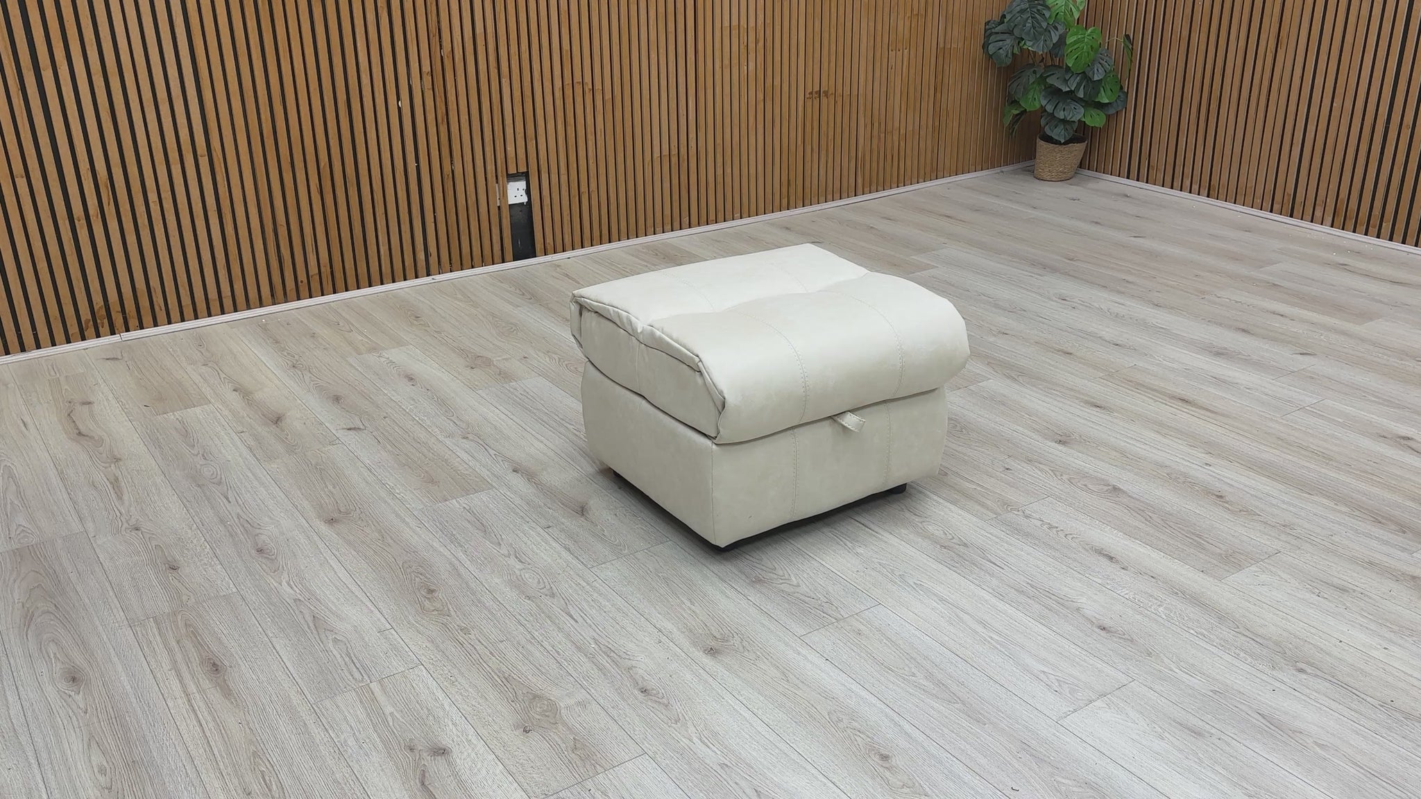 video Preview for a product video, likely demonstrating the footstool's storage function.