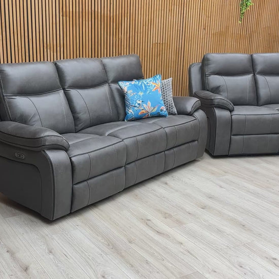 Video showcasing the Electric Power Recliner function and plush, high-back design of the 'Vinson' sofa set.