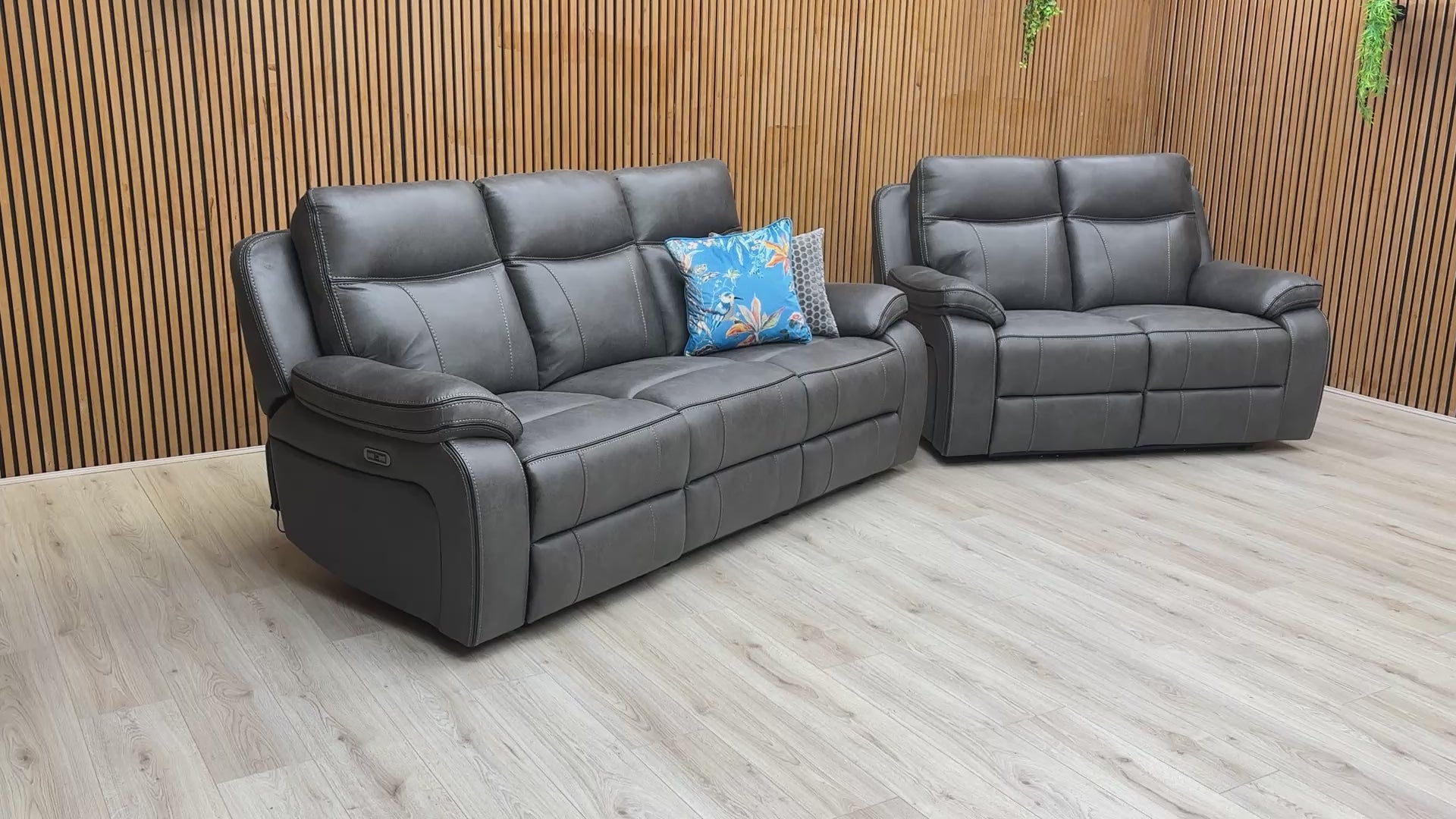 Video showcasing the Electric Power Recliner function and plush, high-back design of the 'Vinson' sofa set.