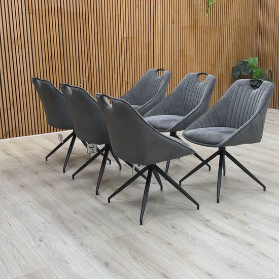 Video : Furniture Village 'Jai' Dark Grey Fabric Swivel Dining Chair demonstrating its rotation/swivel function.