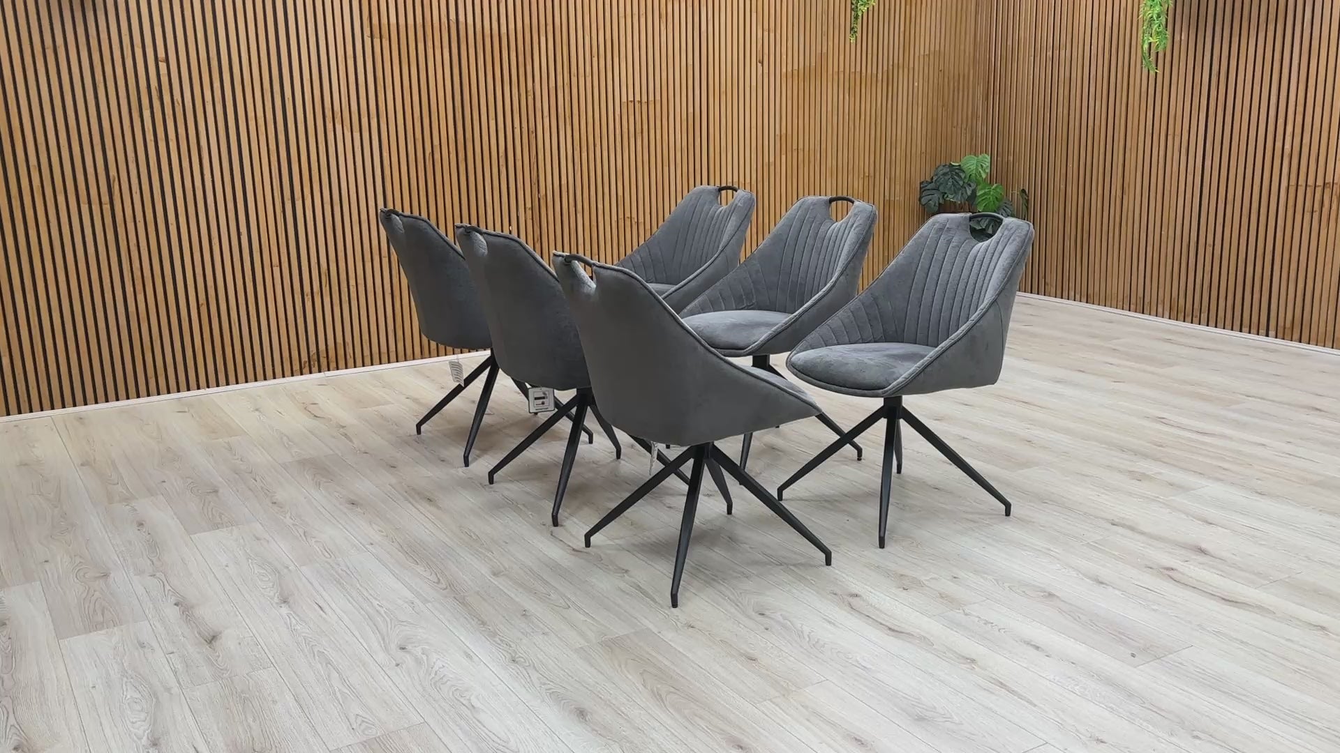Video : Furniture Village 'Jai' Dark Grey Fabric Swivel Dining Chair demonstrating its rotation/swivel function.