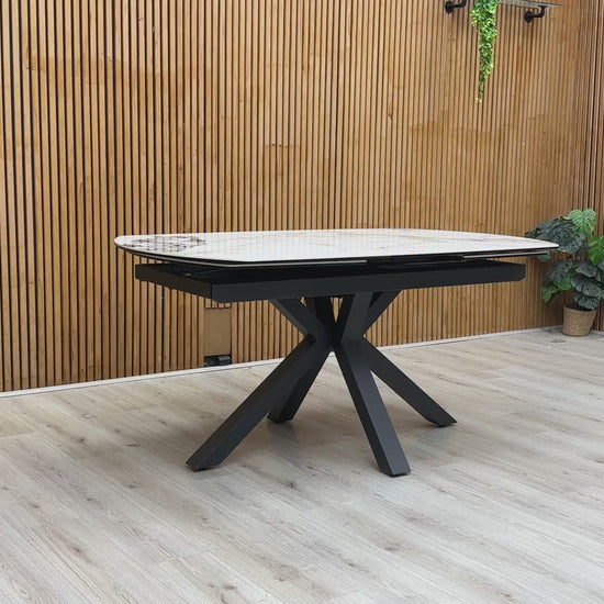 Product video tour of the ‘Doro’ Marble Ceramic Table, demonstrating the effortless swivel extending function that expands the table to seat more guests.