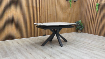 Product video tour of the ‘Doro’ Marble Ceramic Table, demonstrating the effortless swivel extending function that expands the table to seat more guests.